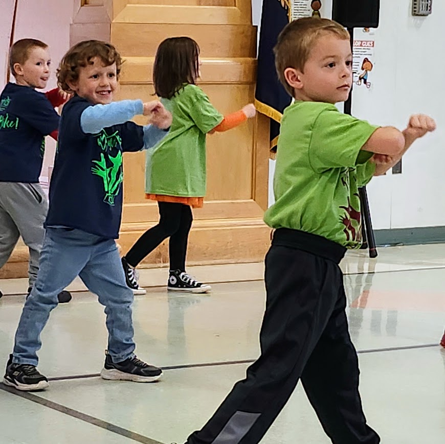 Students perform their dance in the recital Reach for the Peak.